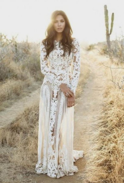 white, long-sleeved, flowing lace dress