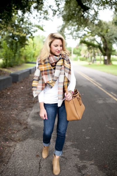 white long-sleeved T-shirt with gold and gray checked blanket scarf