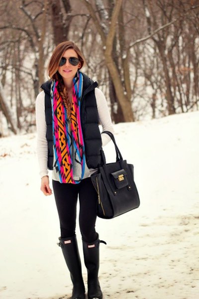 white long-sleeved t-shirt with a rainbow-colored scarf