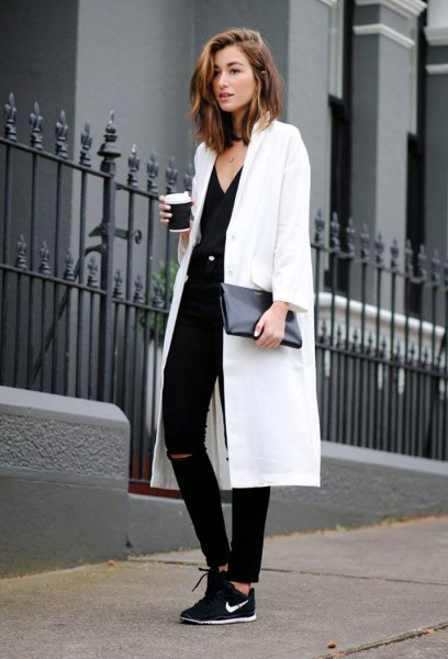 white maxi blazer with V-neckline and black hiking boots