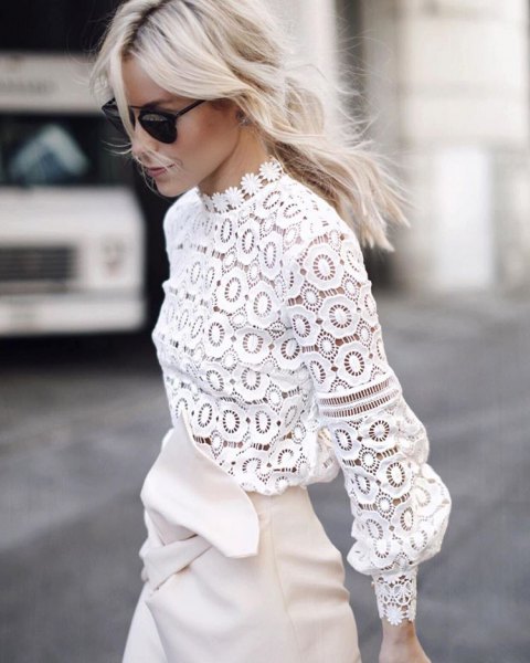 white wrap skirt made of lace blouse with leather neck