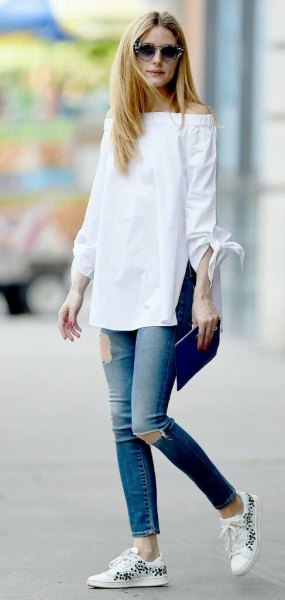 white off the shoulder long blouse with ripped ankle jeans