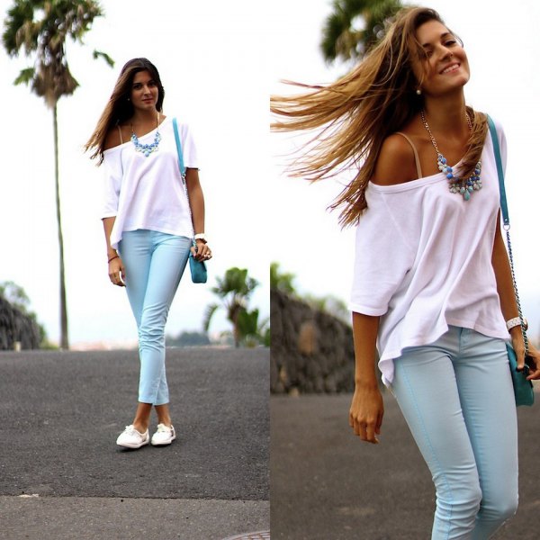 white one-shoulder short-sleeved sweater with light blue cuff pants
