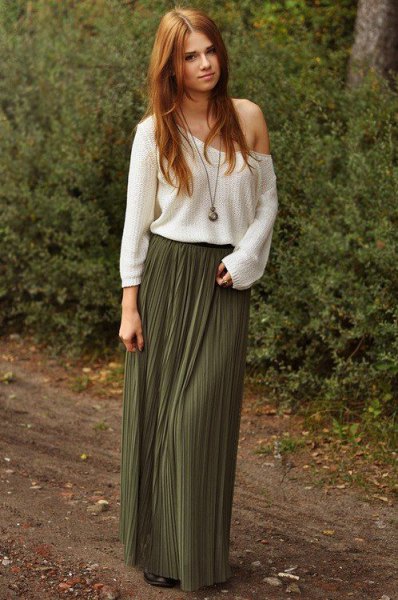 white strapless sweater with pleated floor-length skirt