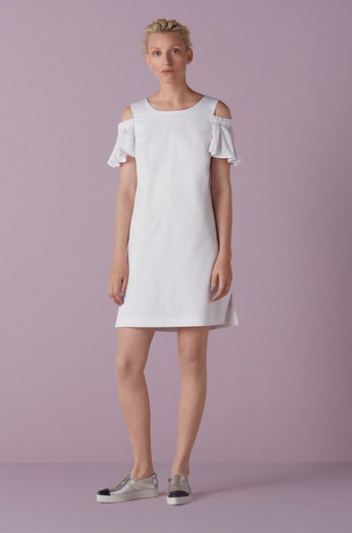white mini shift dress with ruffled sleeves and open shoulders