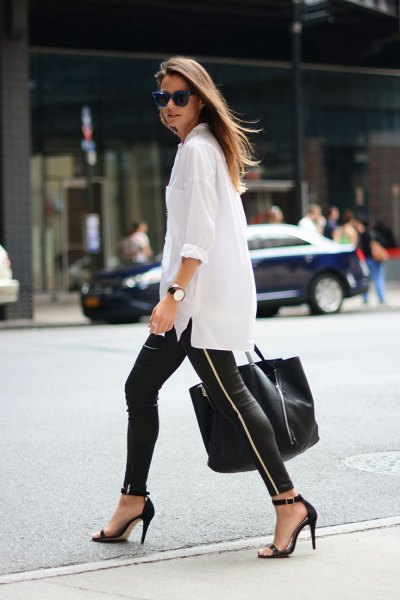 white oversized shirt with buttons, leather gaiters and heels