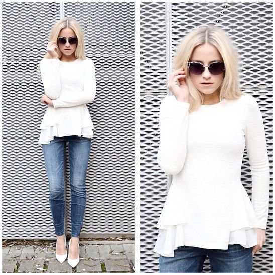 white peplum sweater with frilled blouse and jeans