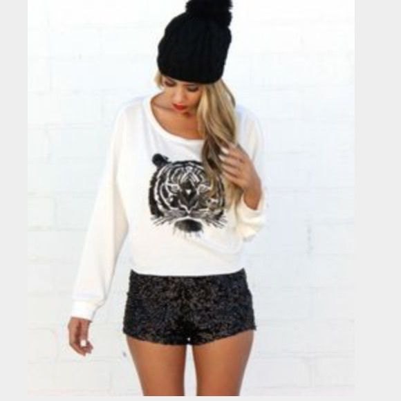 white printed sheater with relaxed fit, black shorts