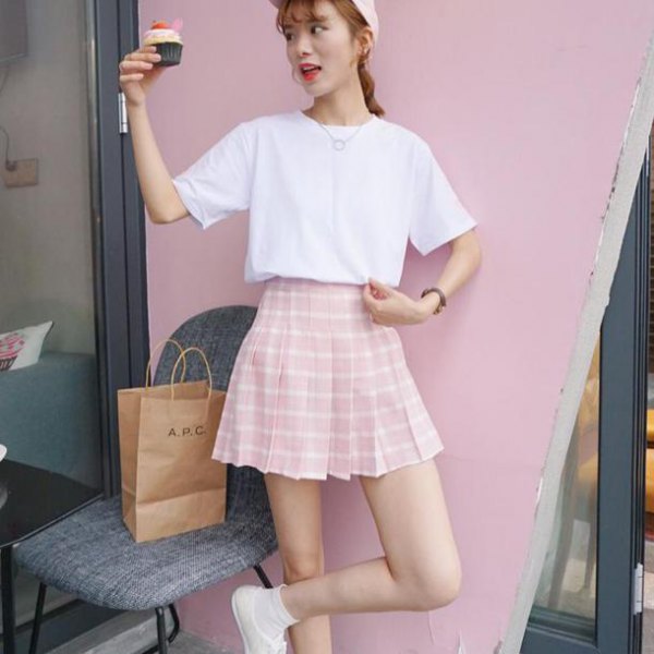 white t-shirt with relaxed fit and pink and white checked skater skirt