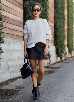 white, ribbed, chunky sweater, black leather skirt with lace