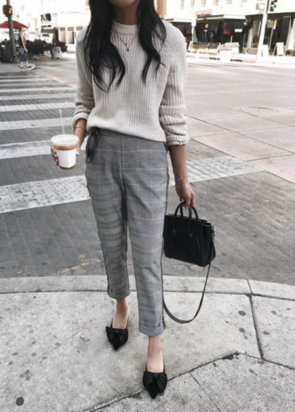 white, ribbed, thick sweater with cropped, checked, narrow-cut trousers