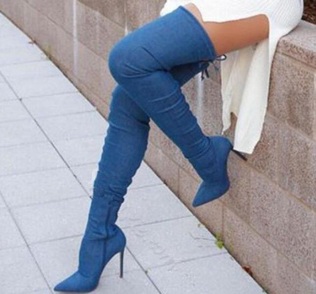 white, ribbed sweater dress with high-heeled jeans boots