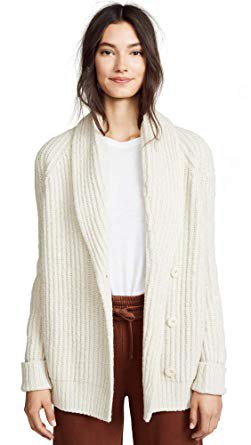 white, ripped cardigan with a round neckline