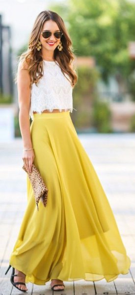 white top with scalloped hem and mustard-yellow, flowing maxi skirt