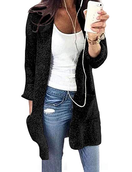 white, figure-hugging tank top with scoop neckline and black longline cardigan sweater