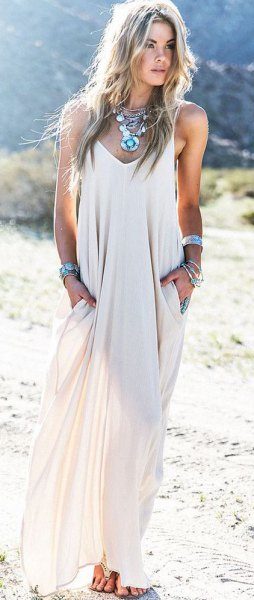 white semi-transparent chiffon maxi summer dress with boho necklace
