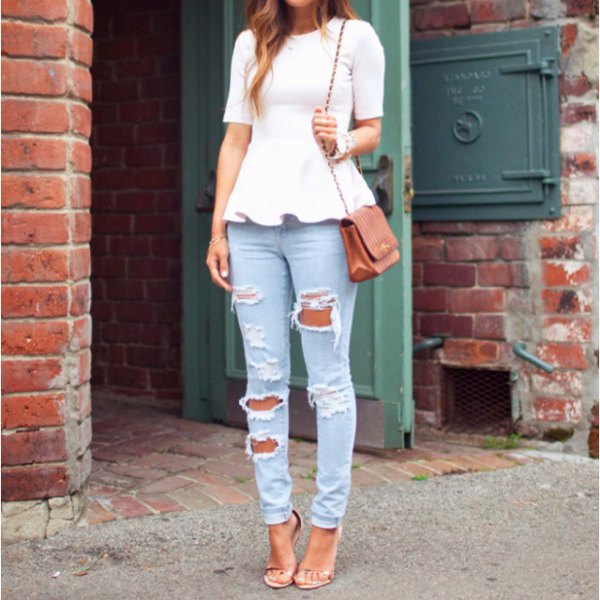 white short-sleeved peplum top with ripped light blue jeans