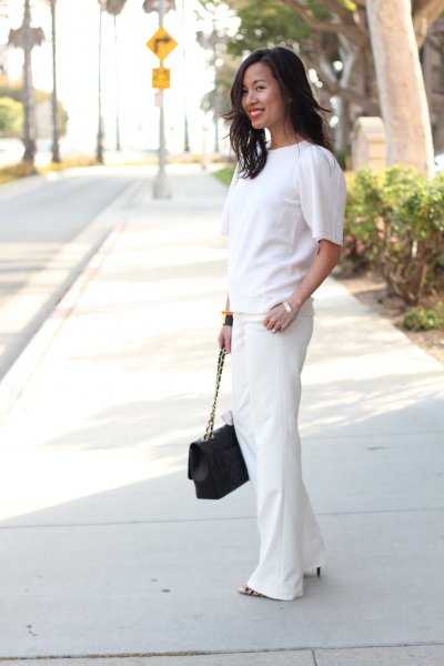 white short-sleeved sweater with wide-cut suit trousers