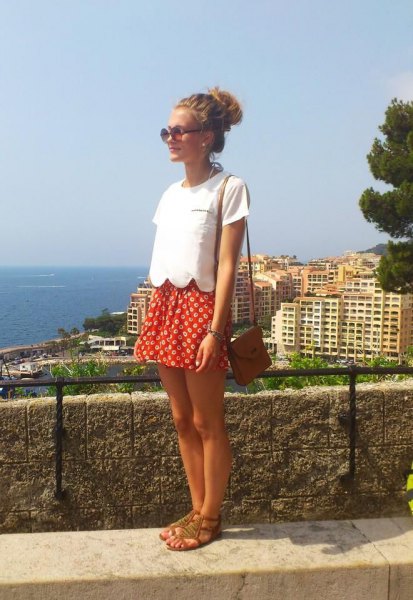 white short-sleeved top with red and white polka dot mini skirt