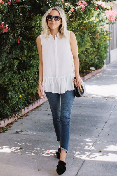 white sleeveless tube with ruffles and short-cut tube jeans