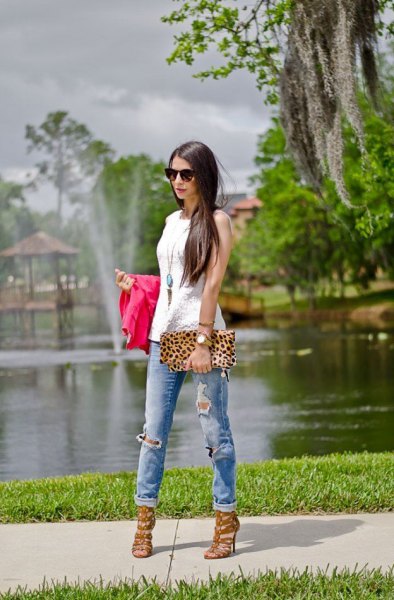 white sleeveless top with a leopard print clutch and pink strappy heels