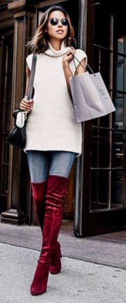 white sleeveless turtleneck sweater with burgundy velvet over the knee boots