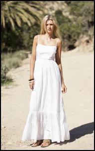 white floor-length airy dress with spaghetti strap