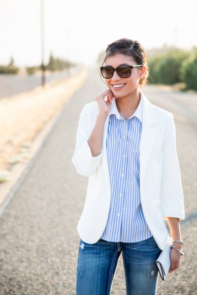 white summer blazer with a relaxed fit and a sky-blue striped shirt with buttons