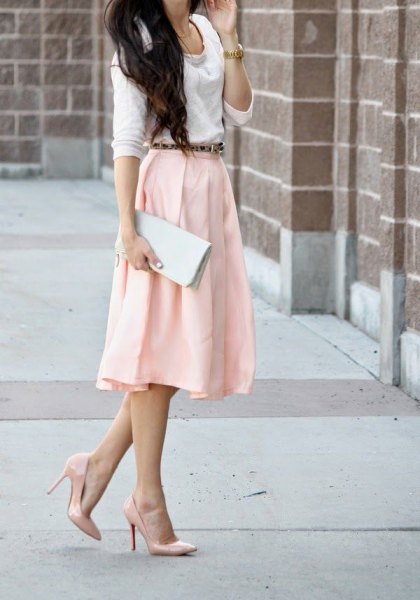 white sweater with a light yellow midi skirt and blushing heels