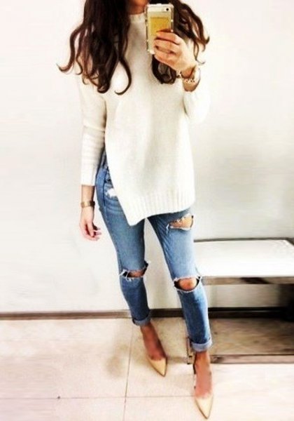 white sweater with ripped skinny jeans with cuffs