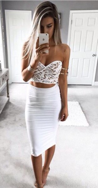 white crop top with sweetheart neckline and high-waisted, figure-hugging midi skirt