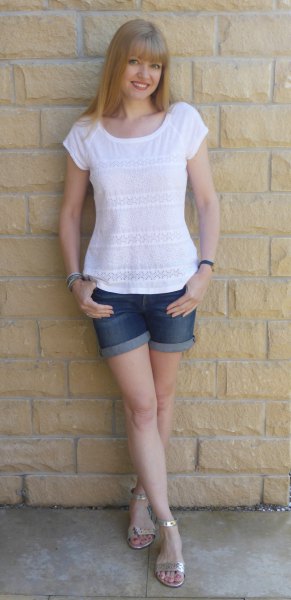 white t-shirt with blue denim shorts with cuffs and silver heeled sandals