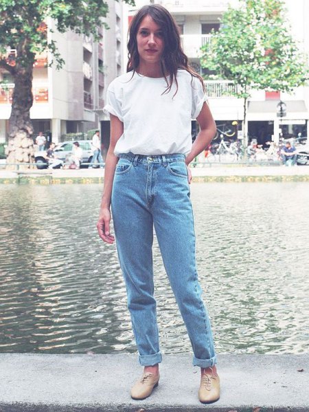 white t-shirt with blue vintage high-waisted jeans