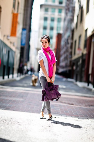 white t-shirt with a pink scarf and gray skinny jeans