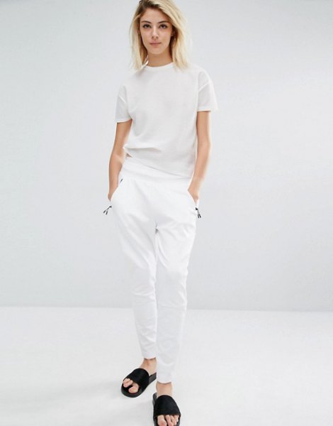 white t-shirt with matching pants and black sandals