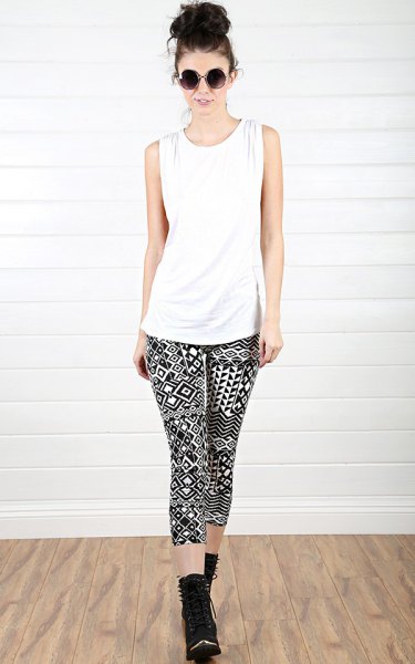 white tank top with black leggings with tribal print