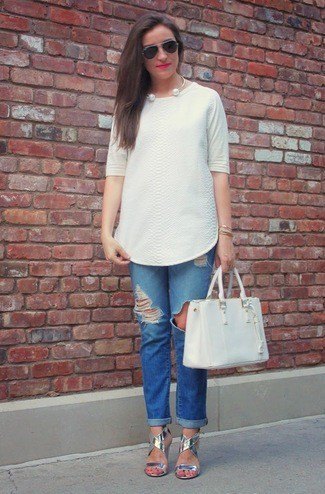 white tunic blouse with blue jeans with cuffs and silver sandals