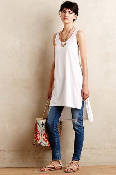 white tunic tank top with blue jeans with a slim fit