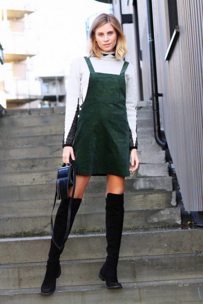 white turtleneck with over-the-knee boots