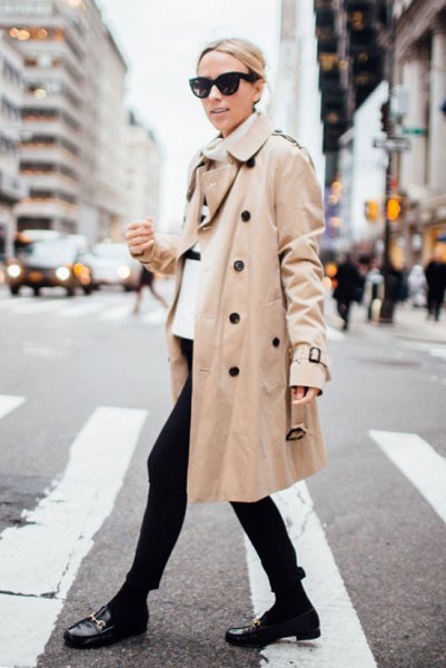 white turtleneck with a beige trench coat