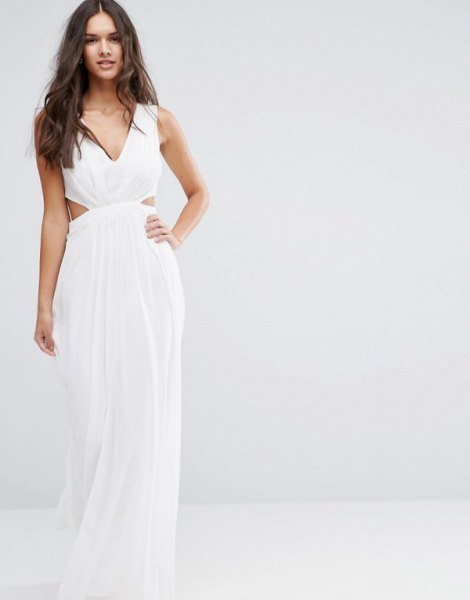 white, floor-length, flowing dress made of chiffon with a V-neck