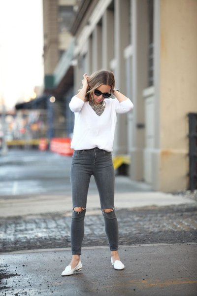 white knitted V-neck sweater, gray, ripped jeans