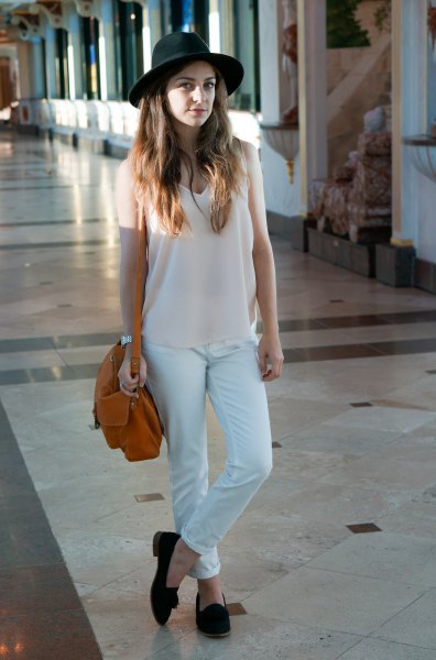 white long tank top with V-neckline, matching chinos and felt hat