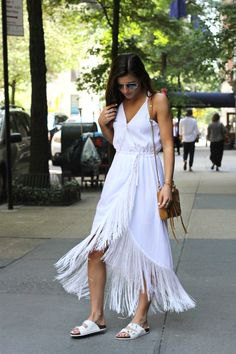white wrap dress with maxi fringes and V-neck