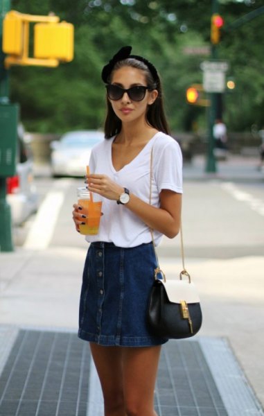 white V-neck t-shirt and skirt with jeans button on the front