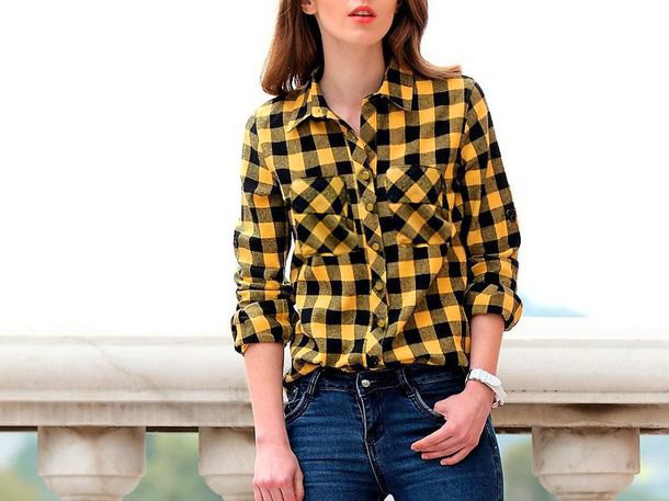 yellow-black checked shirt with dark blue skinny jeans
