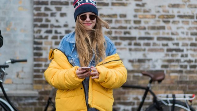 yellow puffer coat with blue denim jacket
