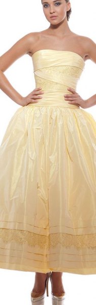 yellow strapless fit and shiny maxi dress